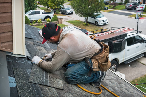 Professional Gutter Installation technician working in South Boston, MA